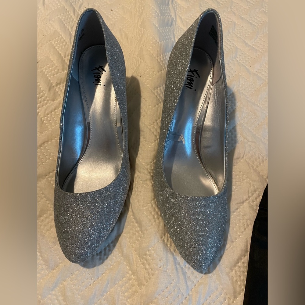 Ladies dress heals. Silver sparkle. Excellent condition.